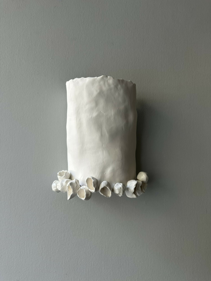 Hand formed ceramic sconce